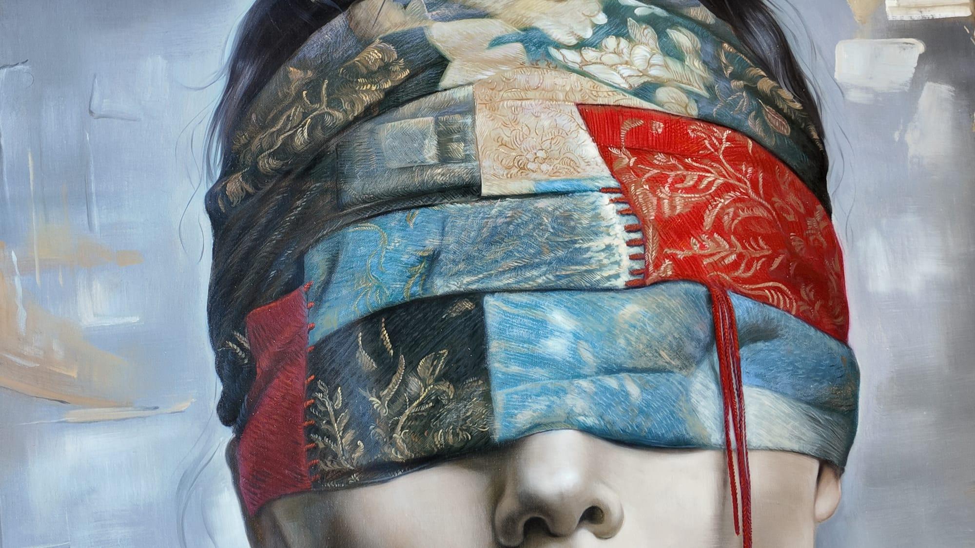 Detail of Vision Within highlighting the stitched brocade band covering the eyes, with visible layered textures and textile fragments.